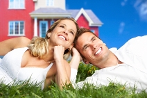 stock-photo-young-love-couple-smiling-dreaming-about-a-new-home-real-estate-concept-29680054